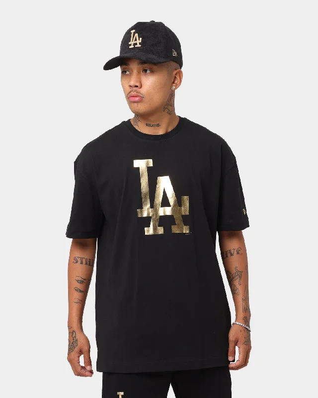 New Era Los Angeles Dodgers "Metallic" Oversize T-Shirt Black/Gold Front Pockets Side Pockets Patch Pockets New Era Los Angeles Dodgers "Metallic" Oversize T-Shirt Black/Gold Front Pockets Side Pockets Patch Pockets
